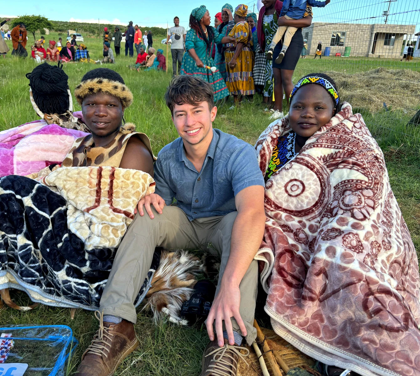 Photographer with community members during Umemulo in Nquthu, KwaZulu-Natal